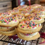 Detailed shot of a soft Lofthouse Sugar Cookie, showcasing its smooth icing and decorations.