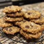 Deliciously baked oatmeal chocolate chip cookies with a golden-brown exterior.
