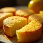 Close-up shot of golden-brown Traditional Southern Cornbread with a textured surface.