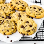 Close-up of soft, golden-brown Eggless Banana Bread Chocolate Chip Cookies with melted chocolate chips.