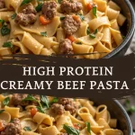 Close-up of creamy beef pasta topped with spinach and cherry tomatoes.