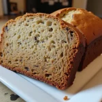 Close-up of golden, moist banana bread made from bananas, peanut butter, and eggs.