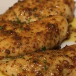 A plated serving of garlic butter chicken.