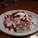 Strawberry shortcake dessert plated and ready to eat.
