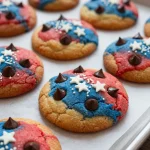 A platter of decorated 4th of July cookies in red, white, and blue star shapes
