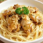 A delicious plate of one-pan creamy garlic butter chicken served with egg noodles