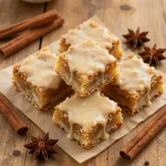 Deliciously baked brown butter apple blondies topped with a sprinkle of powdered sugar